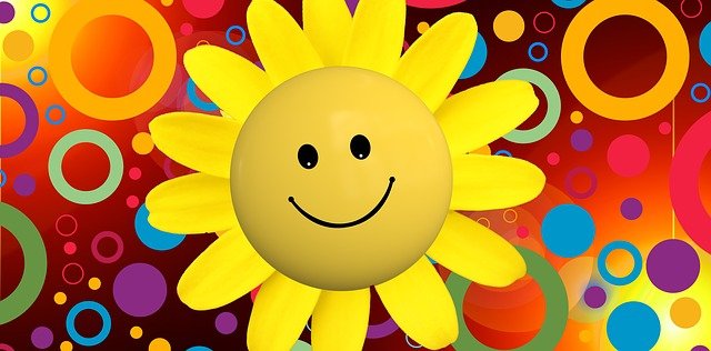 Bild von einer positiven Blume mit fröhlichem Gesicht.